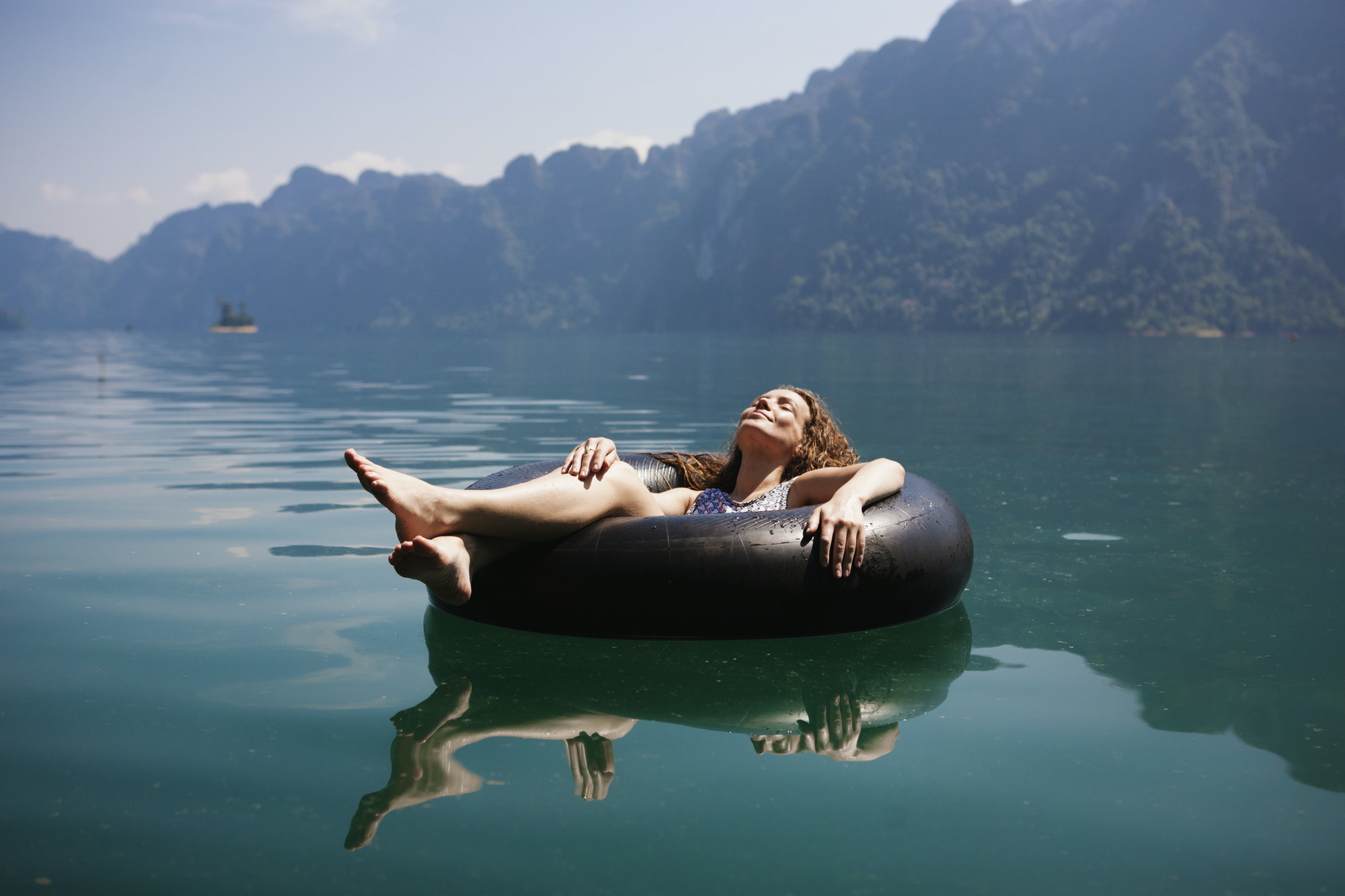 Woman relaxing on a floating ring